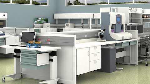 A healthcare laboratory featuring a variety of overhead, base, and mobile storage.